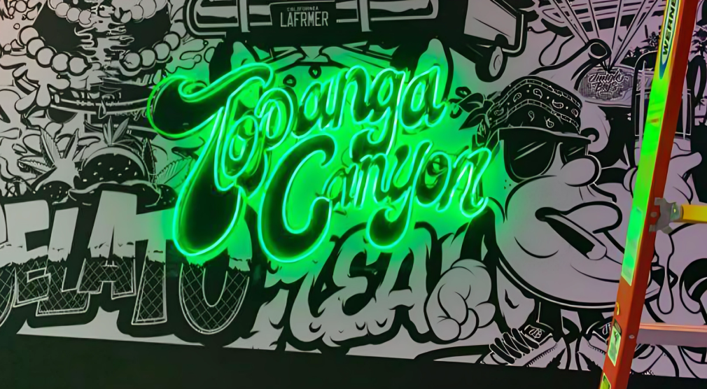 Neon "Topanga Canyon" graffiti art mural.