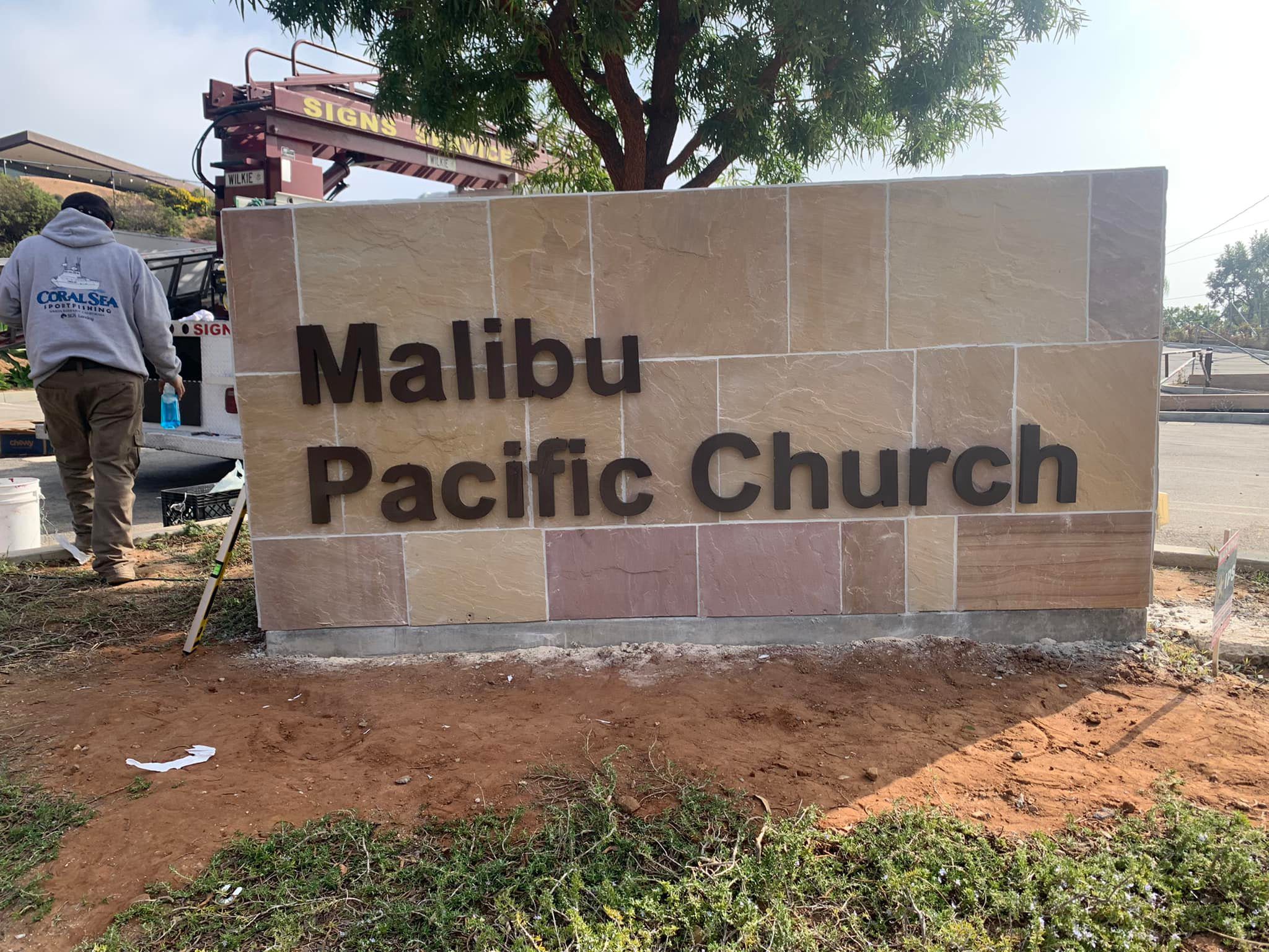 Malibu Pacific Church sign installation outdoors.