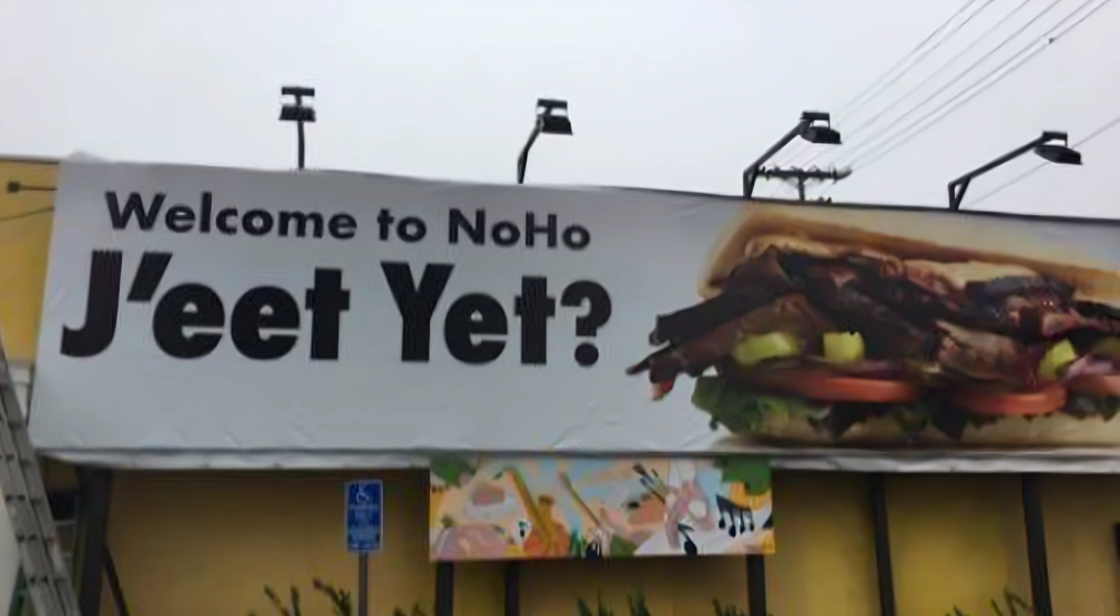 Billboard with sandwich and "Welcome to NoHo.