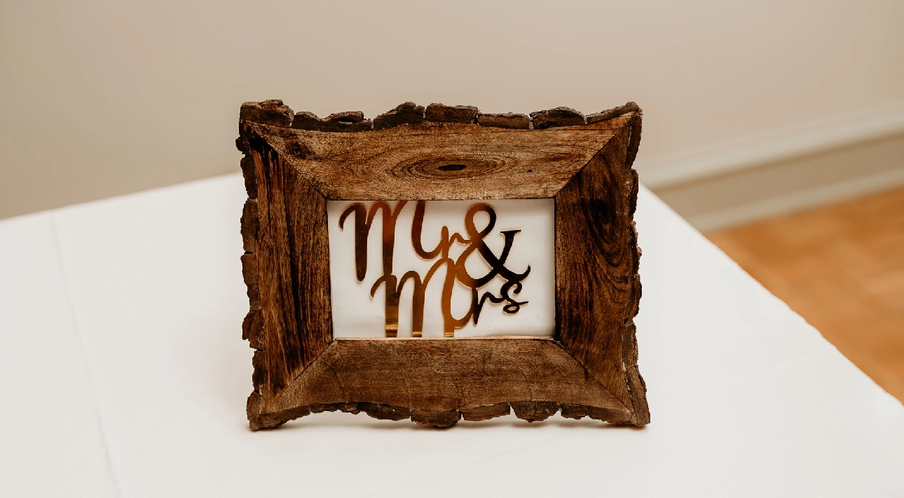 Rustic "Mr & Mrs" wooden frame sign.