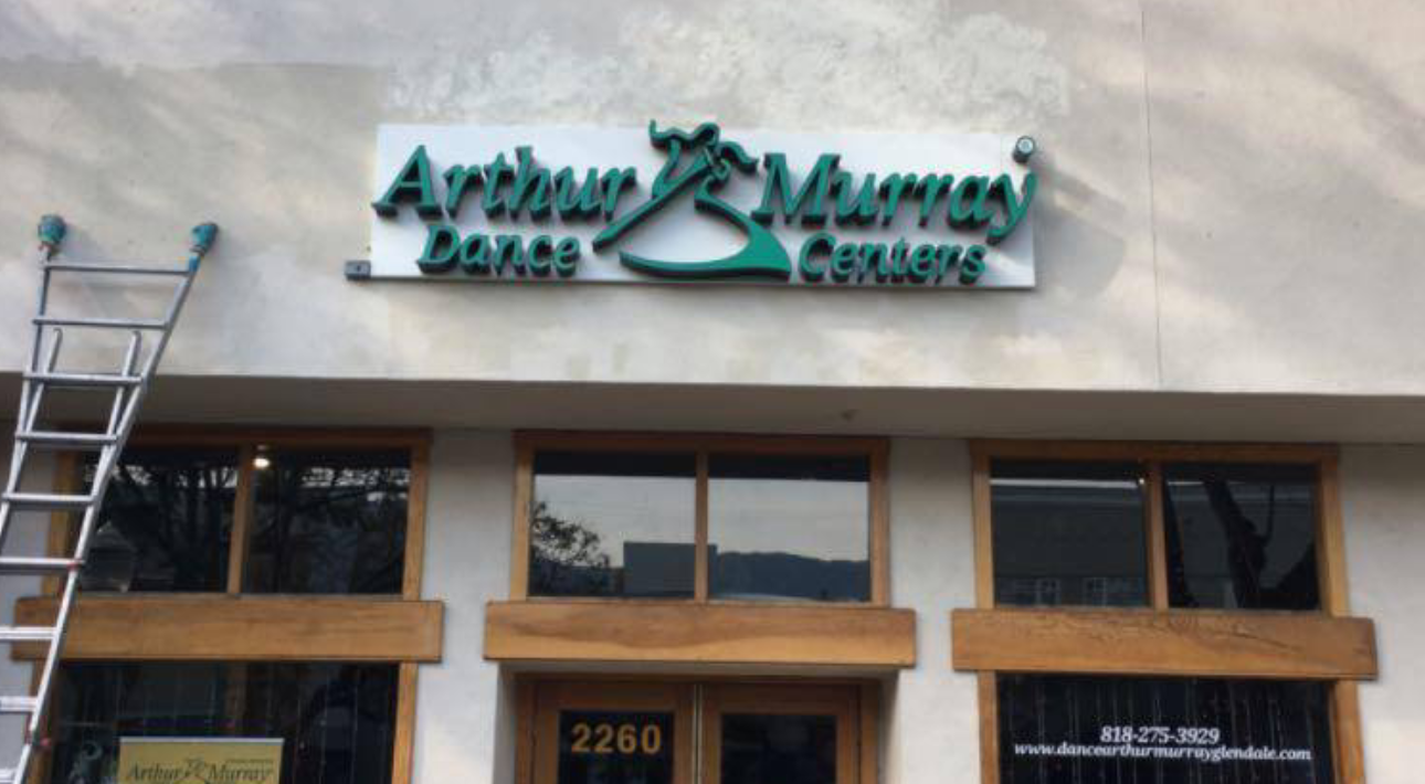 Arthur Murray Dance Center storefront sign.