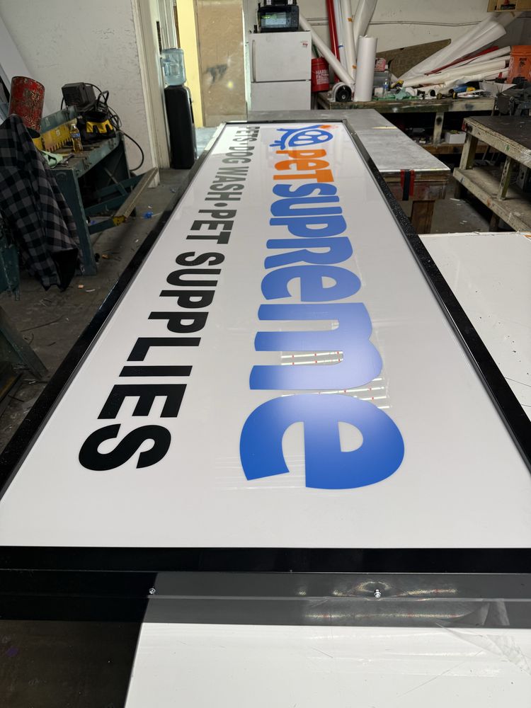 Pet supplies store sign in workshop.