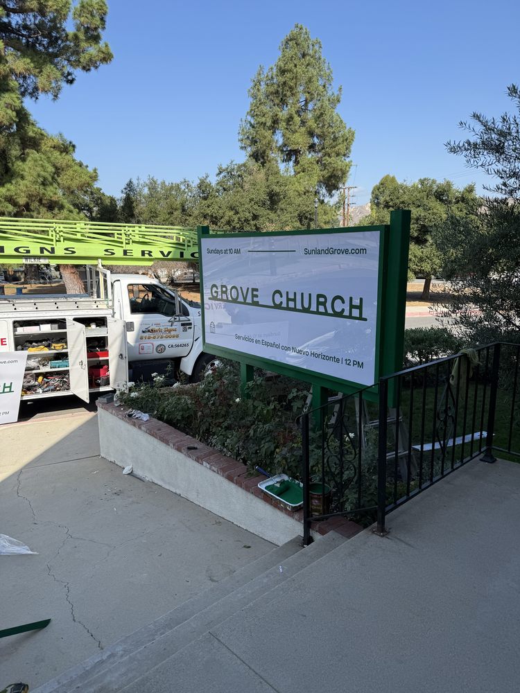 Sign installation at Grove Church entrance.