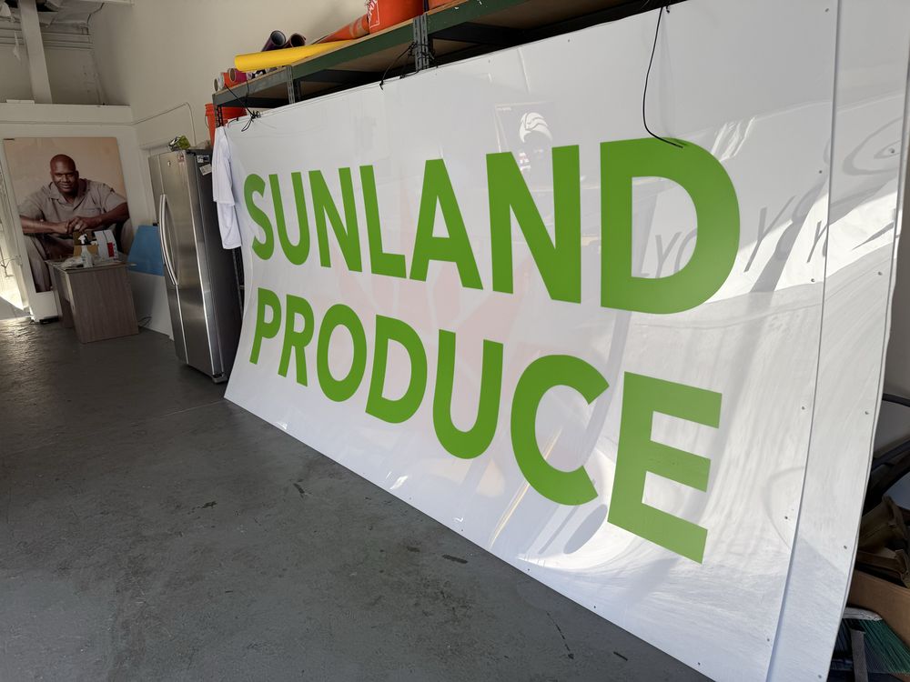 Sunland Produce sign in a workshop.