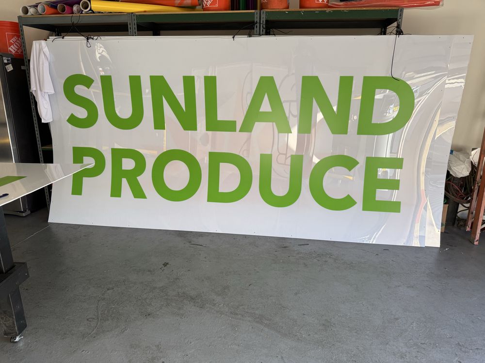 Sunland Produce sign in a workshop.