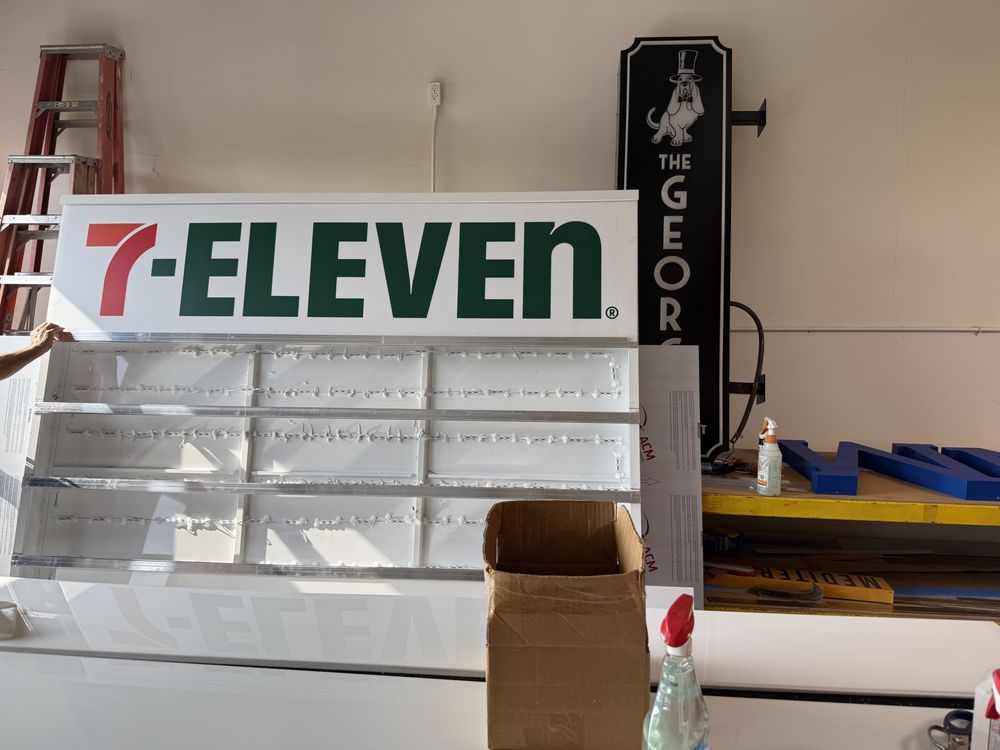 7-Eleven sign in a storage area.