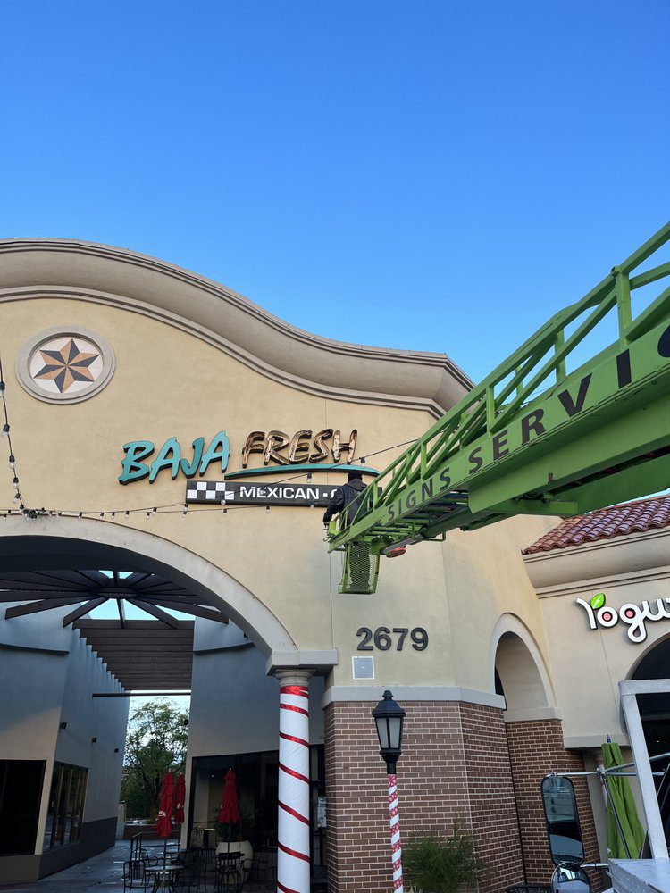 Shopping center with Baja Fresh sign installation.