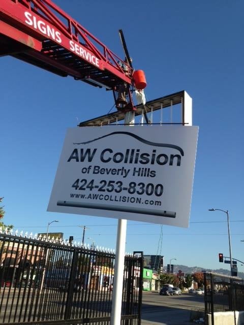 Sign installation for AW Collision shop.
